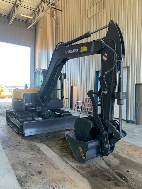 Excavator with breaker attachment
